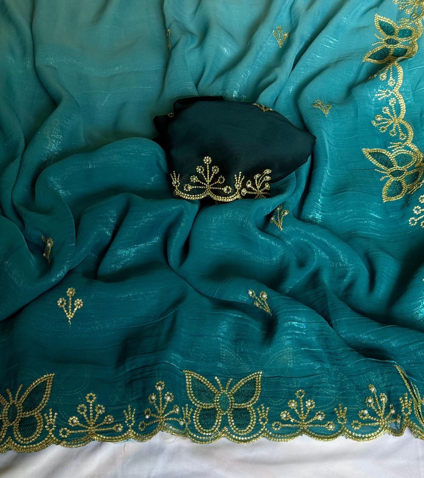 Chiffon Crunch Saree with handmade butterfly design.